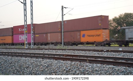 21 January 2021- Badhal, Jaipur, India. Cargo train in motion and passing in speed. Double container train passing through rail track.