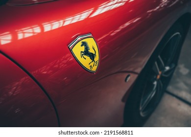 21 July 2022, Dusseldorf, Germany: The Logo And Badge Of The Famous And Legendary Ferrari Company On A Luxury Sports Car And Supercar