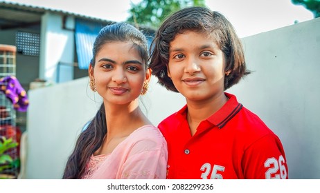 21 November 2021 Reengus, Rajasthan, India. Two Cute And Happy Asian Girl Looking At Camera. Indian Young Teen In Traditional Dresses.