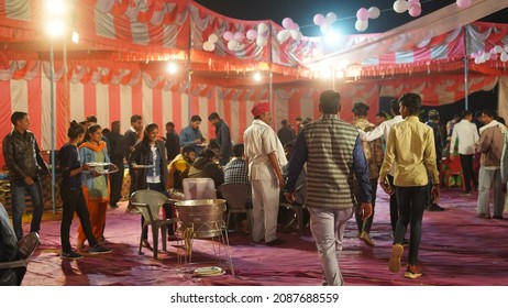 21 November 2021 Reengus, Rajasthan, India. Indian Family Members And Gusts Eating Food At A Marriage Function.