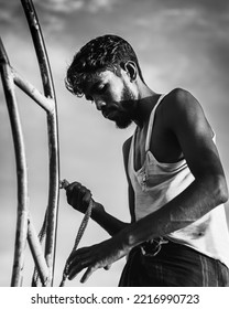 21 September 2022, Sylhet Bangladesh : Portrait Of A Young Asian Male Fisherman Working On His Boat.