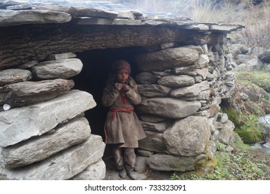 21/04/2017, Inner Himalyan Range India, Kids Dressed Traditionally Working In Water Mill,  Osala Village Is One Of The Remotest Villages In Himalyan India.