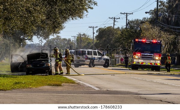 2/16/2014 Largo\
Florida Largo Fire Rescue Battling a Car Fire. Largo is a City\
located in Pinellas County\
Florida.