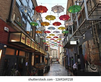 21st December 2018, Dublin. Side Street off Grafton Street called Anne's Lane with an umbrella street display. 