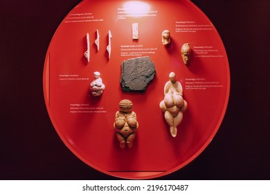 22 July 2022, Dusseldorf, Germany: Venus Of Willendorf And Other Paleolithic Figurines Of Female Deities Carved From Stone And Bone