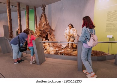 22 July 2022, Dusseldorf, Germany: Parents With Children Take A Tour Of The Neanderthal Museum Of The Ancestors And Evolution. Teaching Science And Anthropology