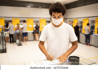 22 Year Old Man With A Protective Mask Inside A Bank Branch In Brazil