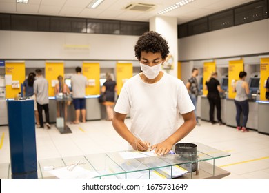 22 Year Old Man With A Protective Mask Inside A Bank Branch In Brazil