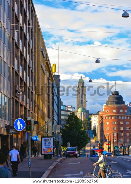 22.08.2018.street\
with cars, people,  colorful old buildings and architecture and\
blue summer sky in Helsinki,\
Finland