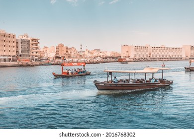 23 February 2021, Dubai, UAE: Abra Dhow wooden boats owned by the State Department of Public Transport RTA taking passengers from one bank of the Dubai Creek to the other