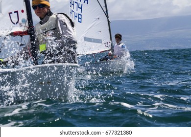 23 July 2015, Young sailors from around the World compete at the 2015 European Optimist Sailing Championships, held at the Welsh National Sailing Centre, Plas Heli, Wales. 