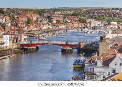 23 May 2017; Whitby, North Yorkshire, England, UK - Whitby with the River Esk and the swing bridge, North Yorkshire, England, UK