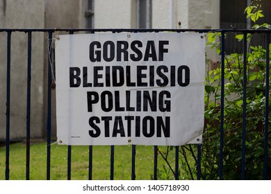 23 May 2019, Swansea, Wales. European Elections To The European Parliament . Polling Station Message On A Wall/fence In English And Welsh. European Parliamentary Election