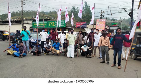 23-01-2021 Munnar Kerala India.  Political Party Members Protesting Against Government In A Street With Their Flags. Political Party Blocked The Road And Protesting.