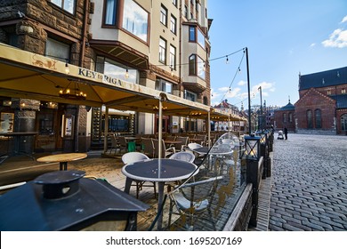 23-03-2020 Riga, Latvia. Empty Street Cafe On The Square Of A European City