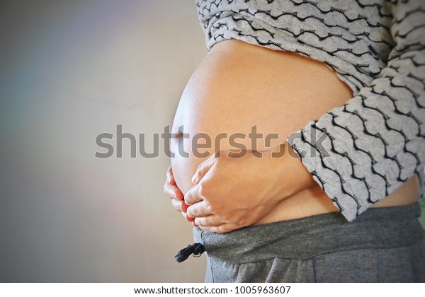 2324 Weeks Pregnant Women On Background Stock Photo Shutterstock
