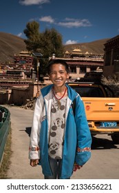 23rd December 2021 Litang, Garze, China: Portrait of young tibetan student on the street of Litang.