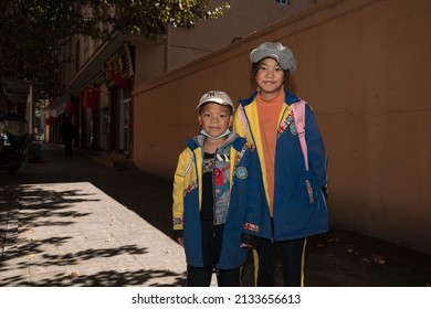 23rd December 2021 Litang, Garze, China: Portrait of young tibetan students on the street of Litang.