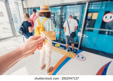 24 February 2021, Dubai, UAE: Passengers on the platform in Dubai RTA metro. To travel in the first subway car you need to buy a gold plastic transport card