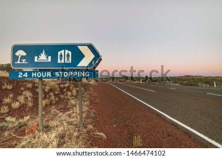 A 24 hour stopping sign aside the road. This free rest area is allowed to sleep, eat, light a fire or use the toilets. It is common in Australia and perfect for pull over and rest. A Backpackers must