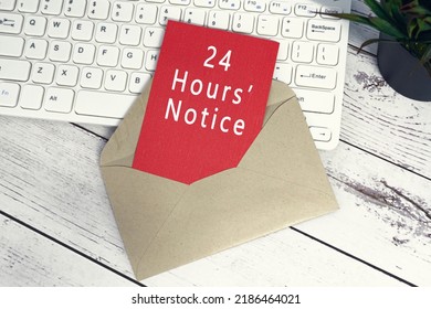 24 Hours Notice Text On Red Note Inside Brown Envelope With Keyboard And Potted Plant Background On Wooden Desk.