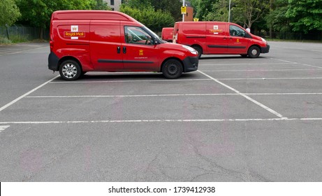 24 May 2020 - England, UK: Red Royal Mail Vans Parked In Car Park