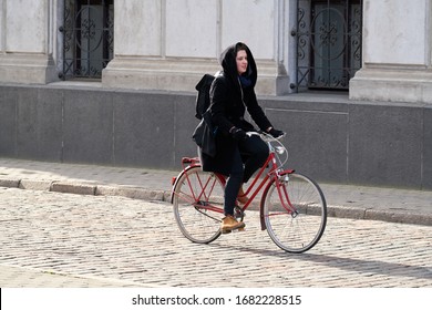 24-03-2020 RIga, Latvia Urban Biking - Teenage Girl And Bike In City.