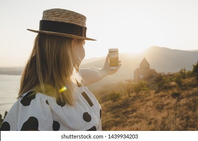 25 August 2018 - Sevan Armenia: Young Woman Taking Photo With Iphone 8 In Armenia