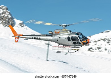 25 February 2017 F-HLLJ Airbus Helicopters H125 - Eurocopter AS350 B3e Ecureuil in flight over Courchevel Altiport, France. It is used to bring people over the Alps Mountains during winter holidays.