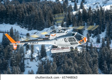 25 February 2017 F-HLLJ Airbus Helicopters H125 - Eurocopter AS350 B3e Ecureuil in flight over Courchevel Altiport, France. It is used to bring people over the Alps Mountains during winter holidays.