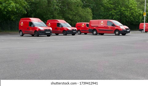 25 May 2020 - London, UK: Five Royal Mail Delivery Vans In Car Park