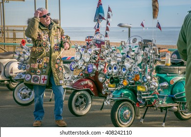 25 October, 2015, Brighton, UK, Mod Culture Man In Parker Coat Near Mod Scooters