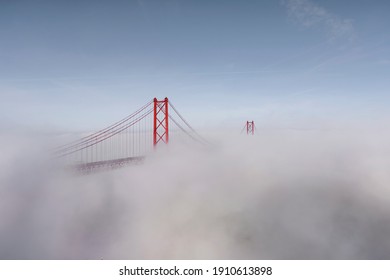 25 Th Of April Bridge During A Foggy Day In Lisboa, Portugal