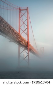 25 Th Of April Bridge During A Foggy Day In Lisboa, Portugal