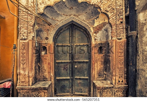A\
250 years old entrance gate of a home in Old Delhi\
area