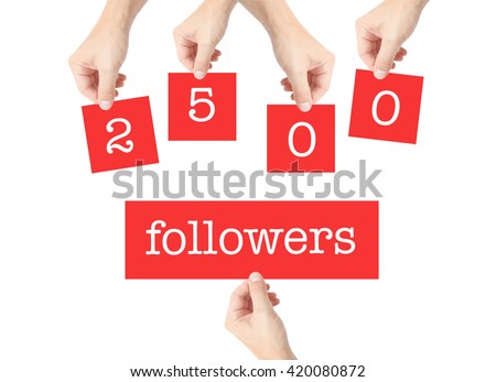 2500 followers written on cards held by hands