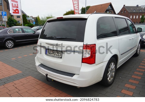 St.Tönis,Germany-September 25,2021:Chrysler Town\
and Country Fifth generation  is a minivan that was manufactured\
and marketed by Chrysler from the 2008 to the 2016\
