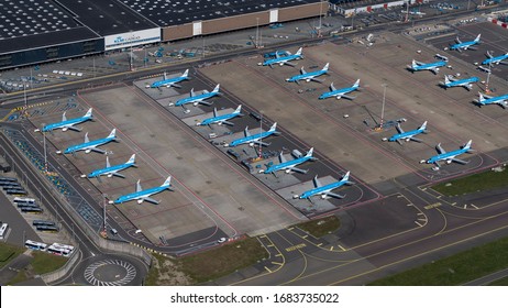 25-3-2020, Amsterdam, Netherlands. Aerial view of A plaform at Schiphol International Airport. Many Embraer 190 planes from KLM Royal Dutch Airlines Cityhopper are grounded because of the Corona virus
