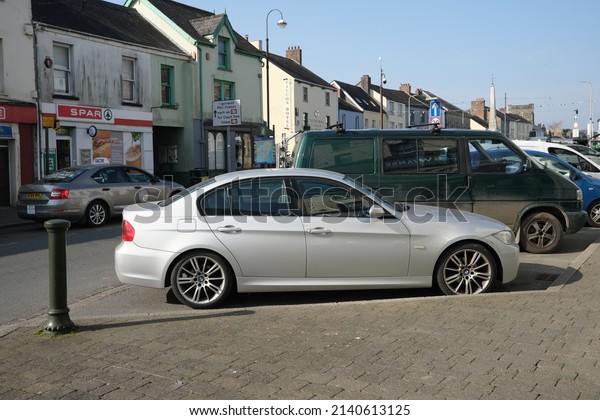 25th March 2022- A silver BMW 318D M Sport,\
four door saloon car, parked on a main street in the town centre at\
Carmarthen, Carmarthenshire, Wales,\
UK.