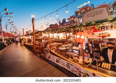 26 February 2021, UAE, Dubai: Traditional Thai Cuisine At A Floating Restaurant With Street Food In Global Village Dubai