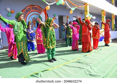 26-01-2020 Dewas, Madhya Pradesh, India. Group of cute Indian school children dancing, during school functions, concept of education, back to school, selective focus