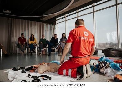 26.03.2022 Kyiv, Ukraine: CPR Training Medical Procedure, Demonstrating Chest Compressions On CPR Doll In The Office Of Modern Company