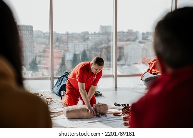 26.03.2022 Kyiv, Ukraine: CPR Training Medical Procedure, Demonstrating Chest Compressions On CPR Doll In The Office Of Modern Company