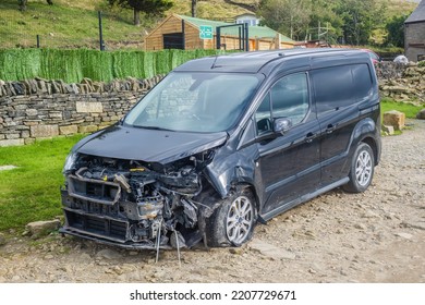 26.09.2022 Horwich, Lancashire, UK. Badly Damaged Black Car Crash Near Horwich In The West Pennines