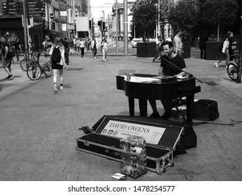 26th July 2019, Dublin, Ireland. Busker Playing The Piano On Grafton Street, Dublin City Centre In The Summer. 