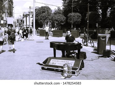 26th July 2019, Dublin, Ireland. Busker Playing The Piano On Grafton Street, Dublin City Centre In The Summer. 