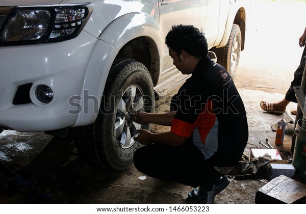 \
27 July 2019 The car\
repairman was repairing the car at the service center in the\
process of car maintenance. Pang Mapha District Mae Hong Son\
Province, Thailand