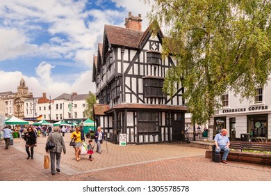 27 May 2016: Hereford, Herefordshire, England, UK - The Old House, High Town, And People Walking Around, Shopping.