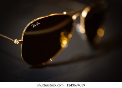 27th - July - 2018 - Staffordshire, Gold Ray ban aviator sunglasses on a black background 