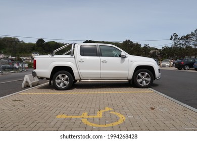 27th May 2021-A stylish  Volkswagen Amarok Highline 4Motion DC A, four door double cab pickup truck, parked in the town carpark at Pendine, Carmarthenshire, Wales, UK.